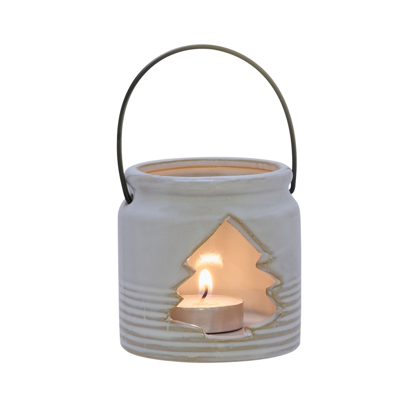 White ceramic lantern with a tree cutout holding a lit tealight on a white background