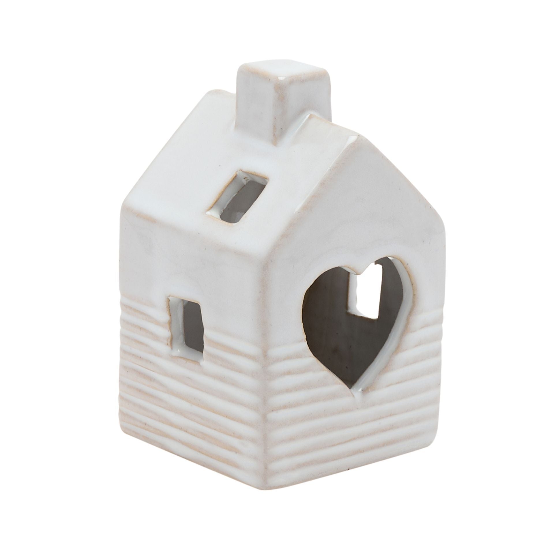 Ceramic house-shaped lantern with a heart cutout on a white background