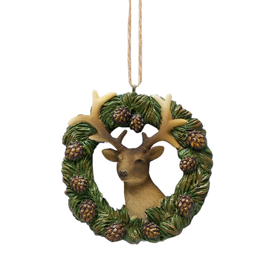 Decorative ornament with a deer in a wreath on a white background