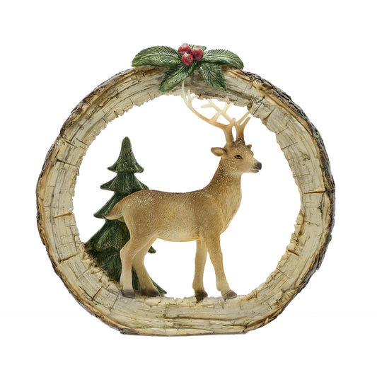 Decorative wreath with a deer and trees on a white background