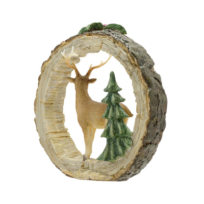 Decorative piece with a deer and trees inside a circular wooden frame on a white background
