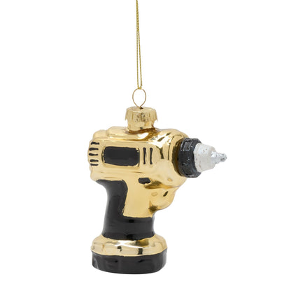 Gold and black drill ornament on a white background