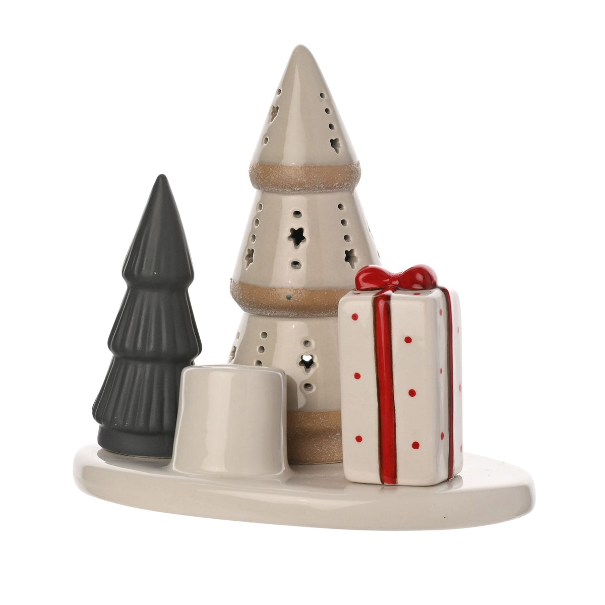 Decorative ceramic set with Christmas tree, gift, and candle holder on a white background