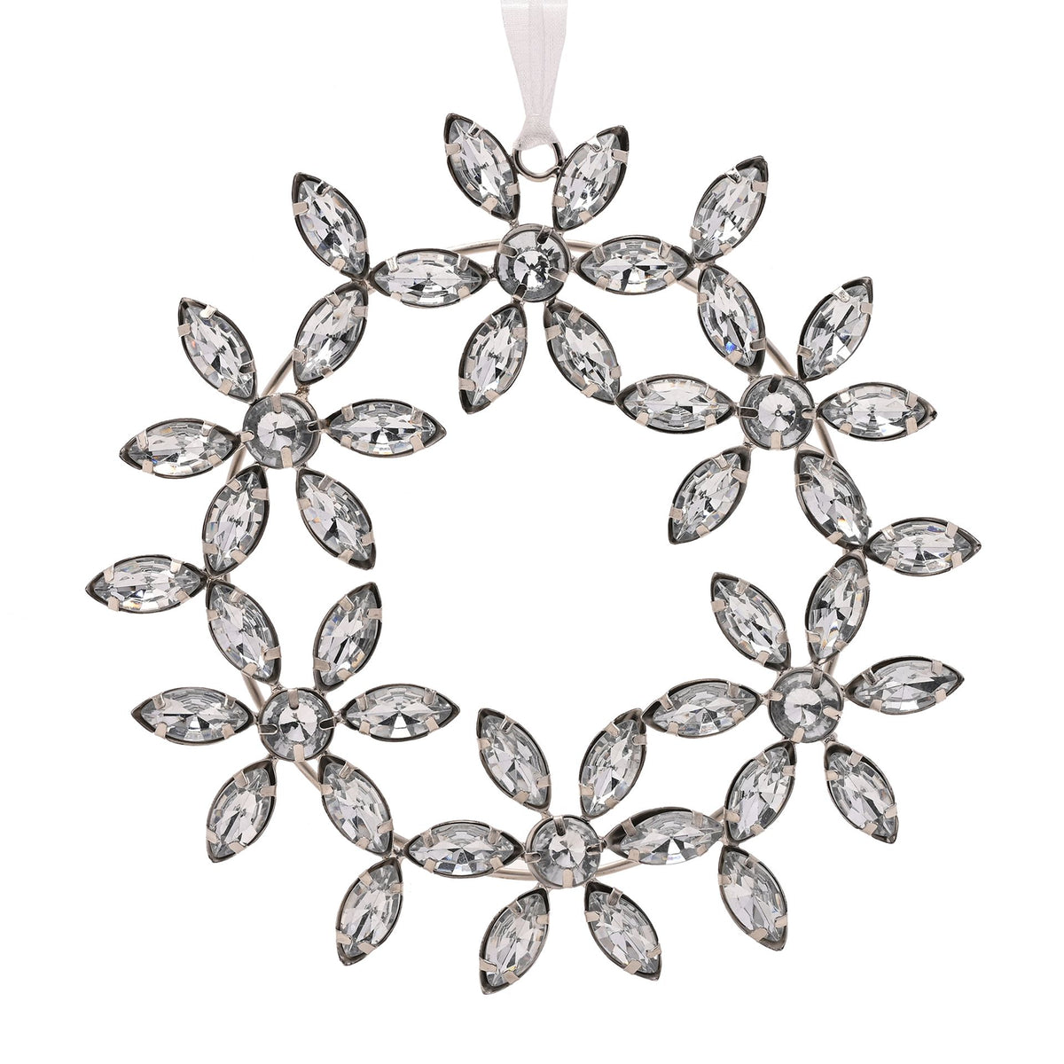 Decorative snowflake ornament with crystal-like stones on a white background