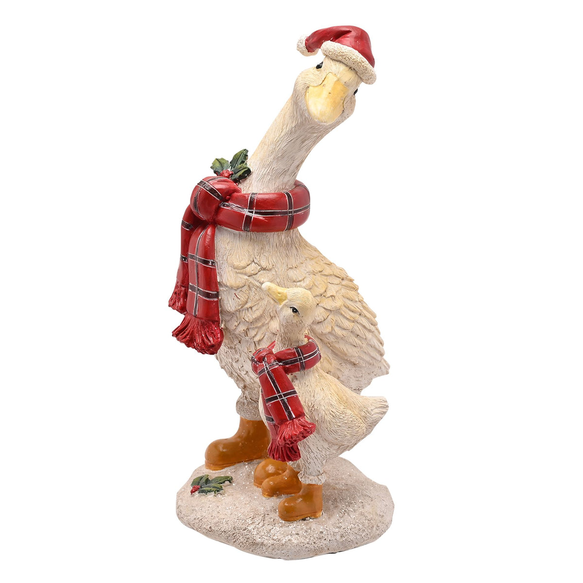 Decorative goose figurine with a red scarf and Santa hat on a white background