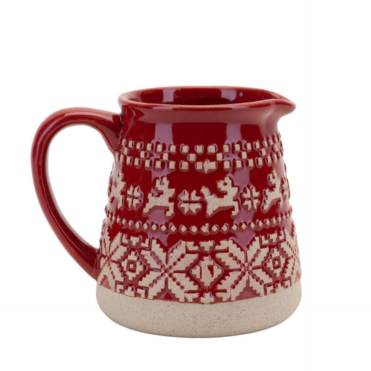 Red ceramic jug with white geometric pattern on a white background